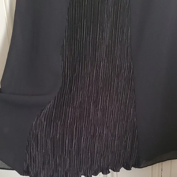 Ursula of Switzerland Elegant Black Sleeveless Dress with Plisse Patel in Front